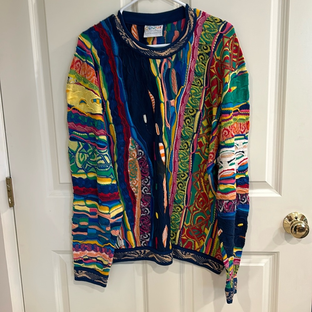 COOGI Men’s Sweater. No tags but never worn. Original $300+